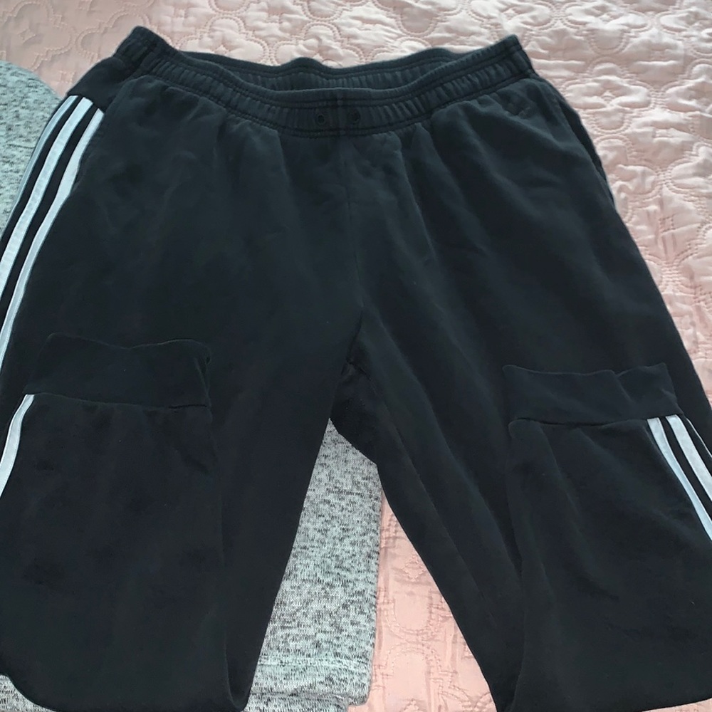 Adidas sweatpants.